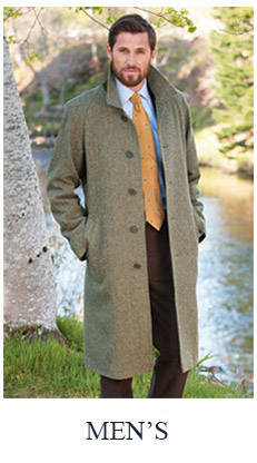 man in tweed jacket coat by river