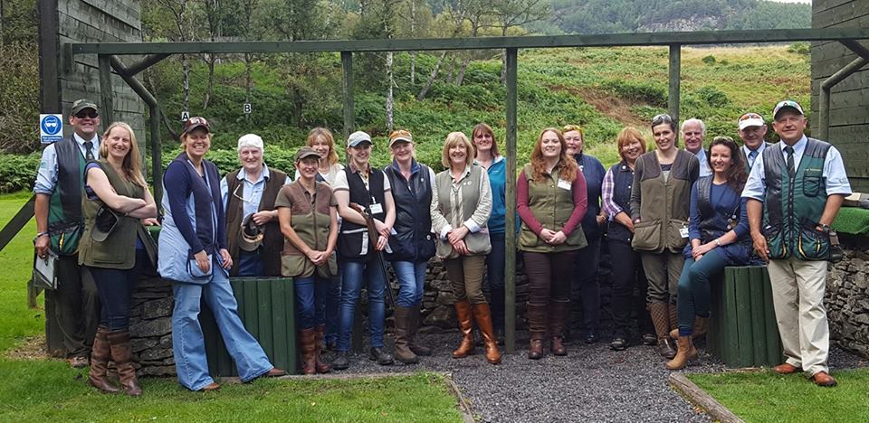 Scottish Ladies Shooting Club team photo in hills