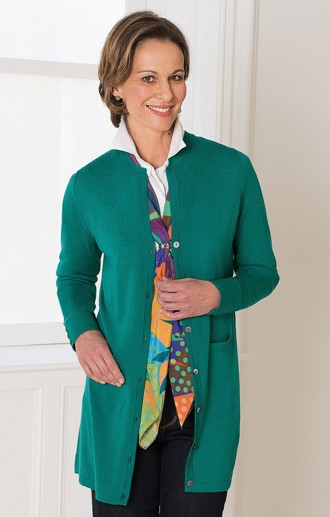 brunette model in longline green merino cardigan