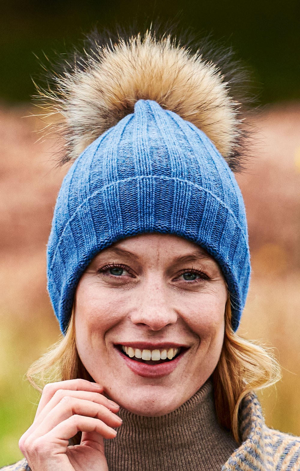 blue hat with pom pom